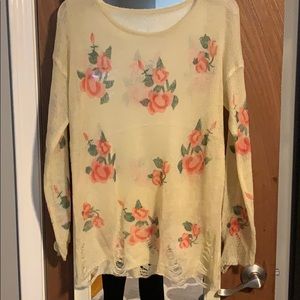 Distressed floral sweater
